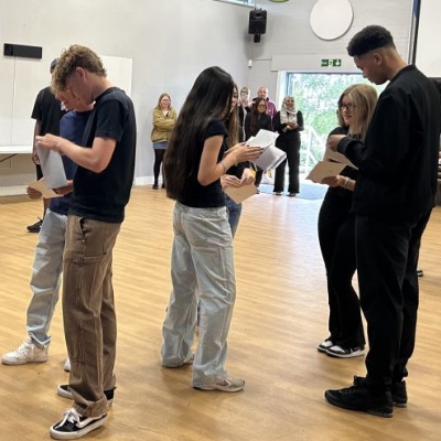 Students pictured opening their GCSE results 